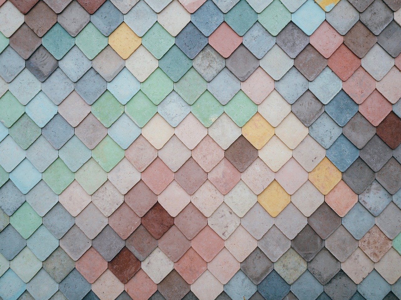A close up of a colorful tiled roof.